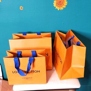 Louis Vuitton Orange Shopping Bags with Blue Handles I Have 2.10×8  1 7×8 2.9×7